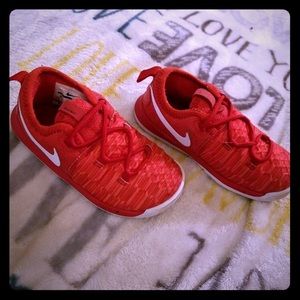 Red and white Nike 8c shoes